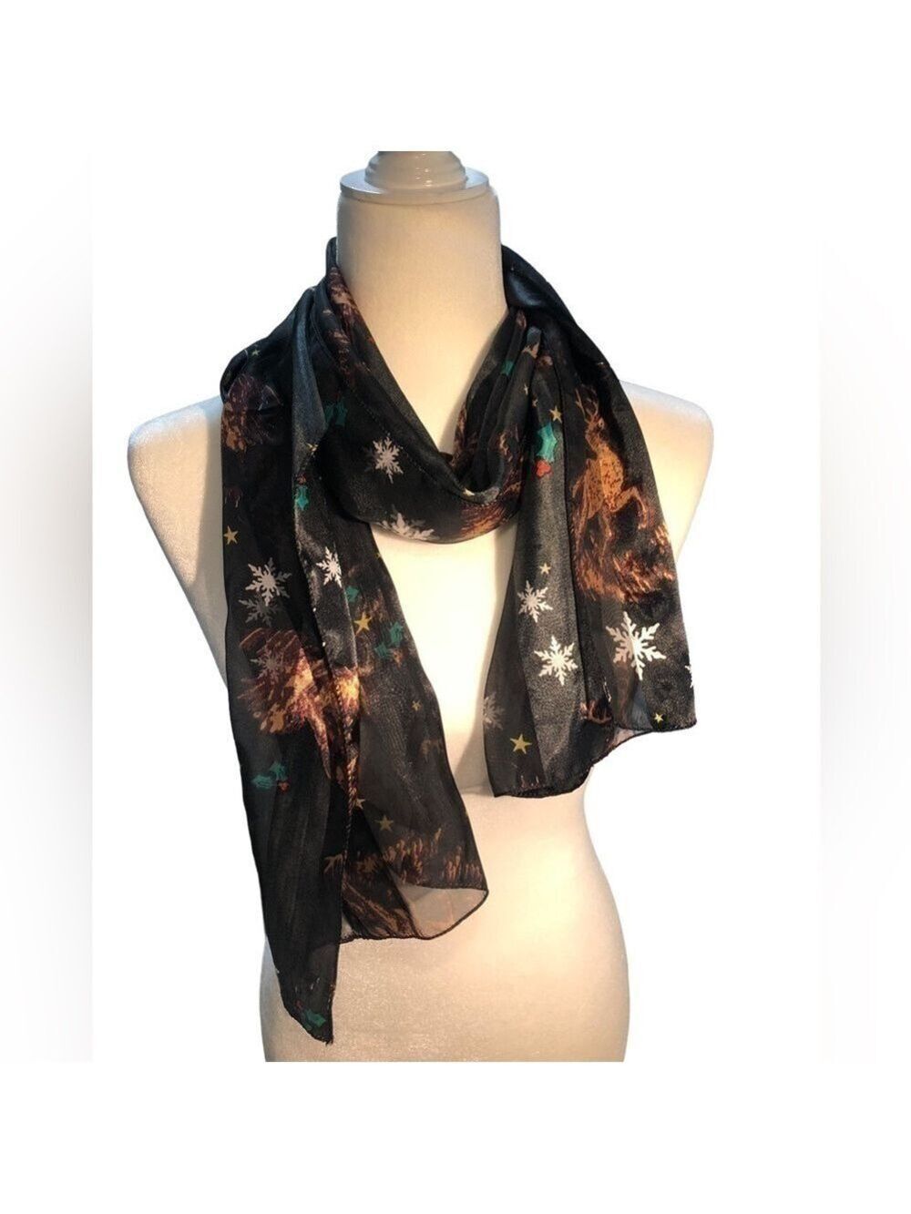 Black scarf with mistletoe, snowflakes, and reindeer